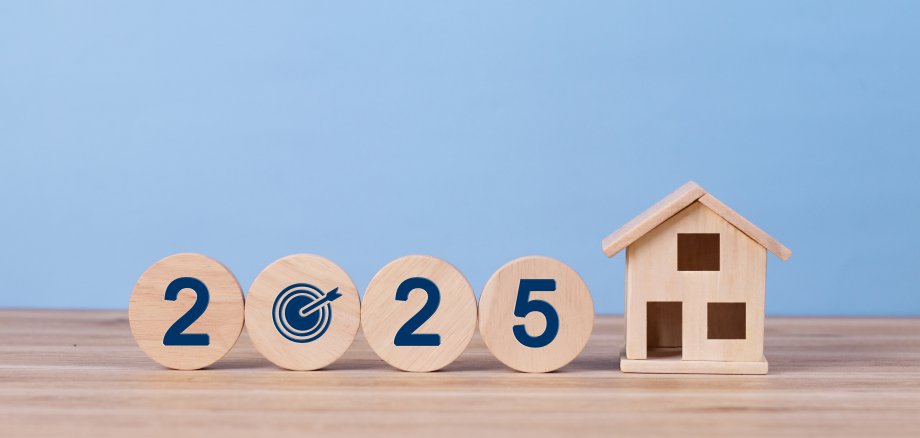 2025 New year property investment concept. Wooden blocks spell "2025" with a target icon. Property tax, New home, rent, real estate, asset management, Business and financial. land. building loans.