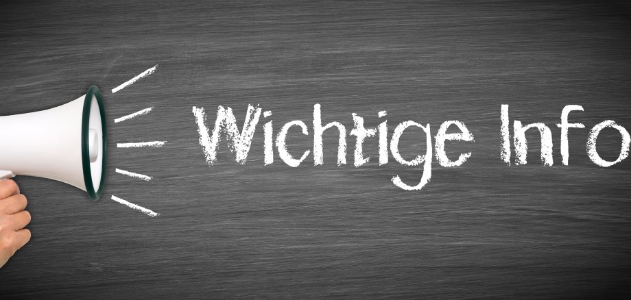 Wichtige Info - Hand mit Megaphon und Text